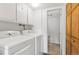 Well-equipped laundry room with washer, dryer, and ample storage space at 7350 Devinney Ct, Arvada, CO 80005