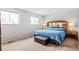 Comfortable main bedroom with dual windows, offering a bright and airy feel at 7350 Devinney Ct, Arvada, CO 80005