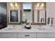 Bathroom featuring dual sinks with modern fixtures, and neutral decor at 1793 W 166Th Ave, Broomfield, CO 80023