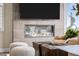 Close up of a fireplace in a living room setting, featuring modern design and cozy ambiance at 1793 W 166Th Ave, Broomfield, CO 80023