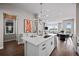 Bright kitchen with stainless steel appliances and a view of the living and dining areas at 1793 W 166Th Ave, Broomfield, CO 80023