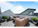Stylish rooftop deck featuring comfortable seating and a cozy fire pit at 1793 W 166Th Ave, Broomfield, CO 80023