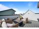 Relaxing rooftop deck featuring seating and a modern fire pit at 1793 W 166Th Ave, Broomfield, CO 80023