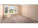 Bright bedroom with large windows providing ample natural light at 16901 E Chenango Ave # E, Aurora, CO 80015