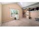 Bedroom with ample closet space and a large window for natural light at 16901 E Chenango Ave # E, Aurora, CO 80015