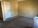 Unfurnished carpeted room with closet and neutral walls, ready for your personal design and furnishings at 16901 E Chenango Ave # E, Aurora, CO 80015