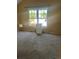 Bright room features large window and ample space; perfect for customization and comfort at 16901 E Chenango Ave # E, Aurora, CO 80015
