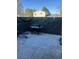 Back patio with an outdoor grill and a fenced-in yard at 16901 E Chenango Ave # E, Aurora, CO 80015