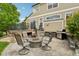 Backyard patio area with fire pit, a grill, and comfortable seating at 641 Briar Haven Dr, Castle Pines, CO 80108