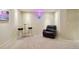 Basement with a dark leather recliner and high-top table at 641 Briar Haven Dr, Castle Pines, CO 80108