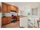 Upstairs landing has a built-in desk, cabinets and shelving; perfect for an office or study space at 641 Briar Haven Dr, Castle Pines, CO 80108