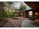 Beautiful backyard with a covered patio, an outdoor swing, and lush landscaping; perfect for outdoor living at 2060 Hoyt St, Lakewood, CO 80215