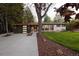 Inviting home with a modern garage, well-maintained lawn, and stylish front door at 2060 Hoyt St, Lakewood, CO 80215