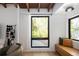 Cozy reading nook with cushioned bench, wood floors, and natural lighting at 2060 Hoyt St, Lakewood, CO 80215