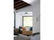 Cozy reading nook with cushioned bench, wood floors, and natural lighting at 2060 Hoyt St, Lakewood, CO 80215