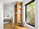 Cozy reading nook with bench seating, storage, and a window view at 2060 Hoyt St, Lakewood, CO 80215