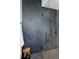Stylish shower with herringbone tile and glass enclosure at 2060 Hoyt St, Lakewood, CO 80215