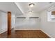 Large basement featuring hardwood floors, neutral color, and lots of space at 11338 Donley Dr, Parker, CO 80138