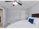 Clean bedroom featuring large bed with elegant bedding, neutral walls, and an adjacent closet at 11338 Donley Dr, Parker, CO 80138