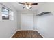 Bedroom featuring nice sized closet, fan, and natural light from the window at 11338 Donley Dr, Parker, CO 80138