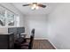 Cozy office space featuring hardwood floors, natural light, and plenty of room for a desk and computer setup at 11338 Donley Dr, Parker, CO 80138