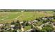 Scenic aerial shot of a neighborhood backing up to a large open field at 7475 W Vassar Ave, Lakewood, CO 80227