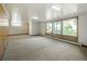Large open basement features multiple windows providing natural light at 7475 W Vassar Ave, Lakewood, CO 80227