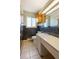Classic bathroom with vanity, tile accents, a mirror and good lighting at 7475 W Vassar Ave, Lakewood, CO 80227
