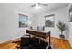 Cozy home office space with hardwood floors, natural light, and stylish decor at 8881 Lilly Dr, Thornton, CO 80229
