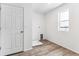 Bright laundry room with washer/dryer hookups and vinyl flooring at 4527 Boone Cir, Brighton, CO 80601