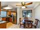 Eat-in kitchen with updated stainless steel appliances and granite countertops at 8394 S Everett Way # E, Littleton, CO 80128