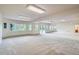 Spacious basement features neutral carpet and plenty of natural light with lots of windows at 6335 Oberon Rd, Arvada, CO 80004