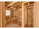 Unfinished bathroom framing with the new window, plumbing, and electrical already installed for your creative freedom at 404 S Oneida Way, Denver, CO 80224