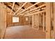 Large unfinished living room provides ample space for creating a personalized living area with great potential at 404 S Oneida Way, Denver, CO 80224