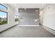 Bright bedroom featuring large windows for natural light and an accent wall at 5224 Lions Paw St, Castle Rock, CO 80104