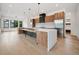 Spacious kitchen boasts custom cabinetry, stainless steel appliances, and a stylish island at 5224 Lions Paw St, Castle Rock, CO 80104