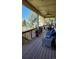 Back deck with views of a green backyard and seating to enjoy the view at 16699 Las Brisas Dr, Broomfield, CO 80023