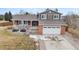 Beautiful two-story home featuring well-maintained landscaping and an attached two-car garage at 1104 Fieldstone Pl, Highlands Ranch, CO 80126