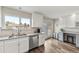 Bright kitchen with white subway tile backsplash, stainless steel appliances, and a spacious countertop at 1104 Fieldstone Pl, Highlands Ranch, CO 80126