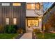 Charming modern home with a well-lit walkway, manicured lawn, and stylish architectural details at 3658 Quivas St, Denver, CO 80211