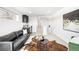 Contemporary living room with sleek furniture, unique decor, and a bright, open layout at 3658 Quivas St, Denver, CO 80211