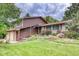 Home with a lawn on a cloudy day at 2621 S Kingston Ct, Aurora, CO 80014