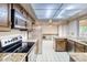 Well-equipped kitchen featuring stainless steel appliances and granite countertops, offering style and functionality at 2621 S Kingston Ct, Aurora, CO 80014
