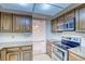 Updated kitchen featuring stainless steel appliances and granite countertops at 2621 S Kingston Ct, Aurora, CO 80014