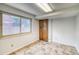 A sunlit room with ample storage, tiled floors and a view of the outdoors at 2621 S Kingston Ct, Aurora, CO 80014