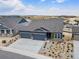 New construction home with two-car garage and landscaping at 3893 Freestone Pt, Castle Rock, CO 80108