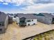 Back exterior view of home showing deck and yard at 3893 Freestone Pt, Castle Rock, CO 80108