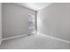 Simple bedroom with gray walls and carpeted floor at 3893 Freestone Pt, Castle Rock, CO 80108