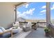 Relaxing deck with fire pit, offering scenic views of the surrounding landscape at 3893 Freestone Pt, Castle Rock, CO 80108