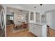 Open concept kitchen with an island that connects to a dining area and living room at 7557 S Cove Cir, Centennial, CO 80122